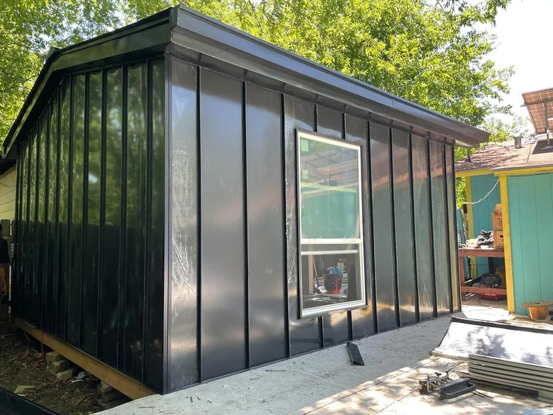 Black standing seam metal wall panels for Metal Roof Installation in La Marque