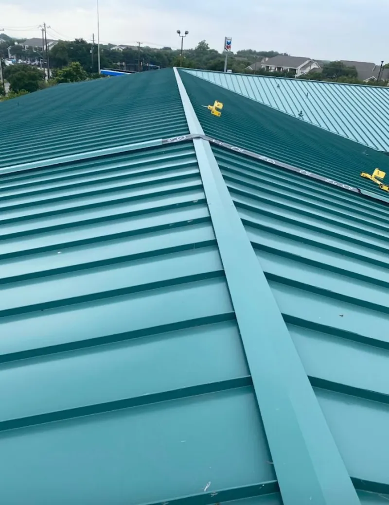Green commercial metal roof ridge and valley for Metal Roof Repair in La Marque